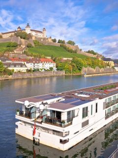 How to pack a capsule wardrobe for river cruise - ship on river