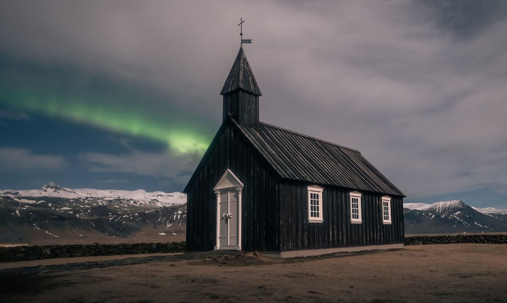 Icelandic Church and Northern Lights - what to wear to see the Northern Lights in Iceland