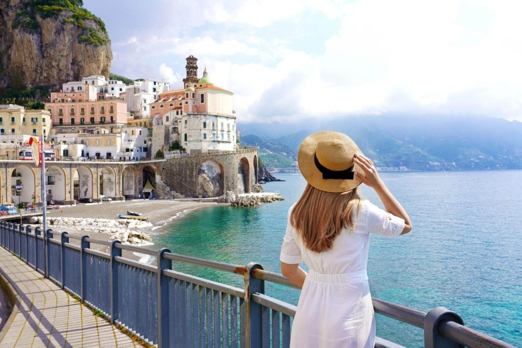 Woman overlooking Atrani on Amalfi Coast 
