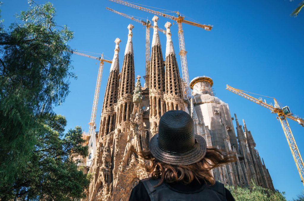 Woman in front of Sagrada Familia Barcelona