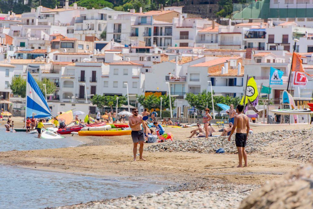 People on beach in Spain in August