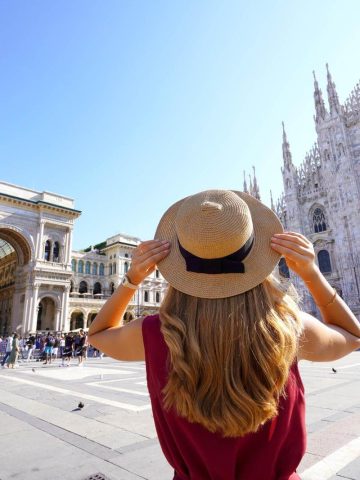 Woman in front of Milan Cathedral in June