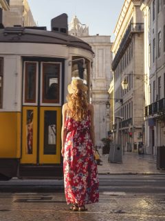 Woman in front of Tram in Lisbon