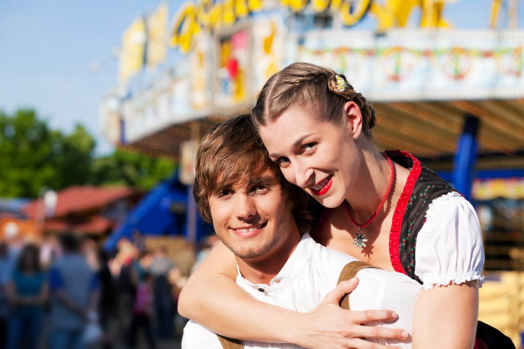 Couple in Traditional Oktoberfest Outfits 