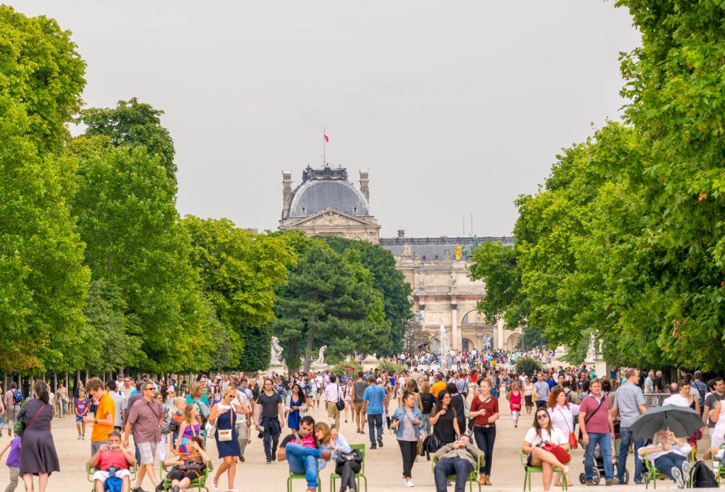 Tuileries Gardens in Paris In July full of tourists