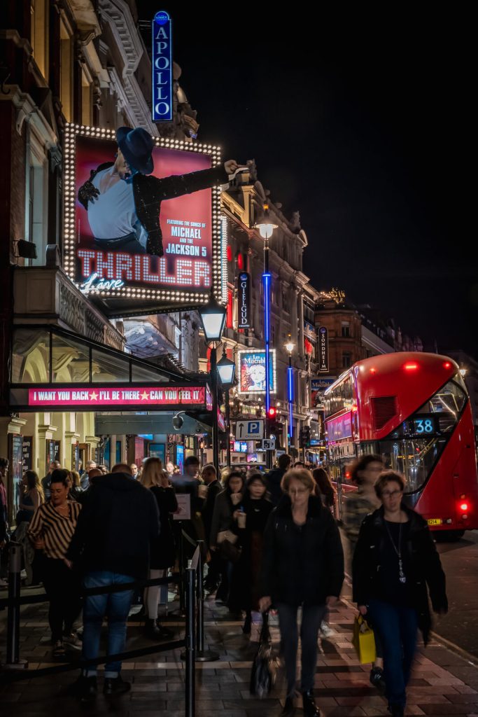 London West end at night with billboard for Thriller show