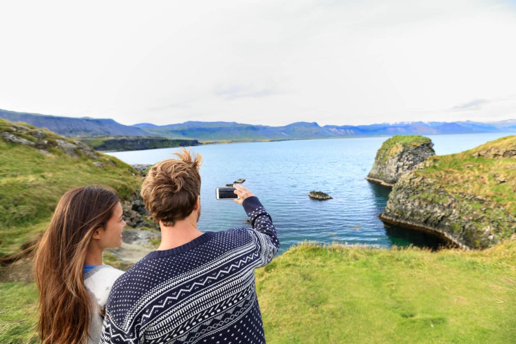 Couple taking selfie in Iceland in summer