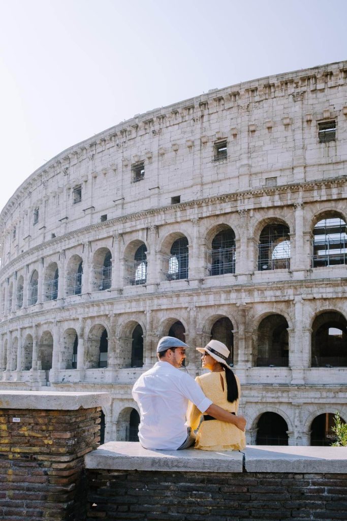 Couple in front of the colosseum in Rome in September 