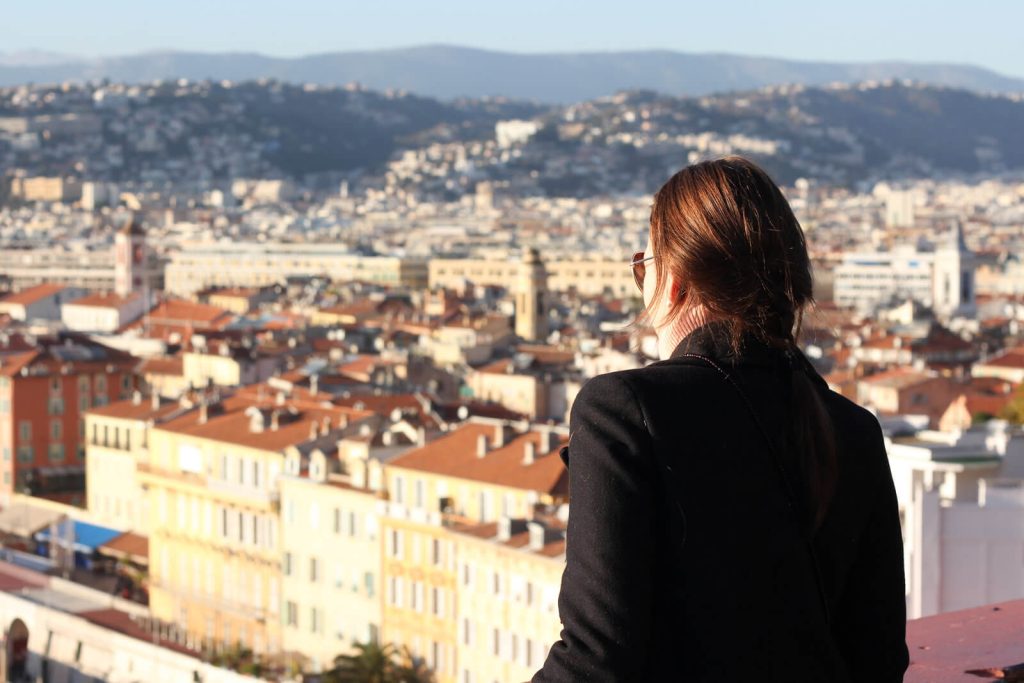 Woman overlooking Nice in Fall