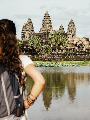Woman stood in front of Angkor Wat