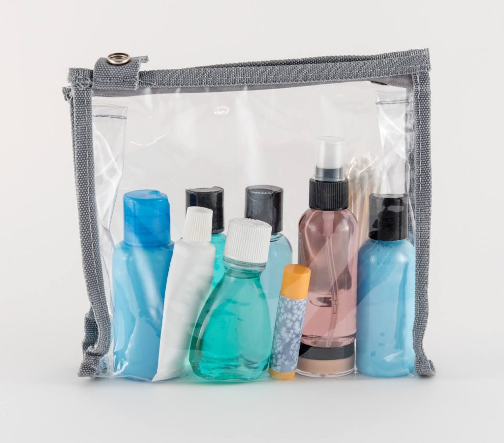 Travel toiletries in clear quart sized toiletry bag