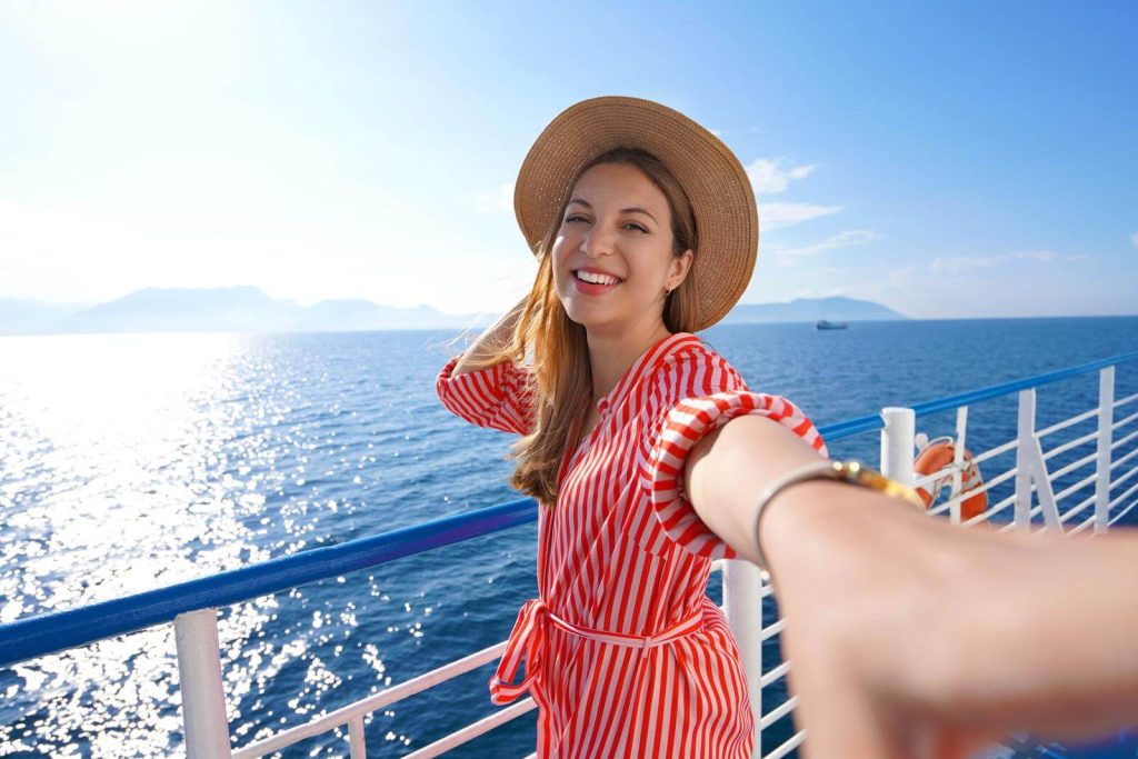 Woman in red dress on cruise ship