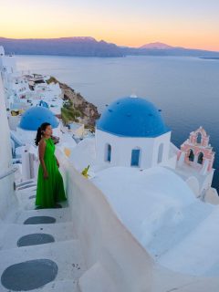 Woman in Green dress in Santorini Greece