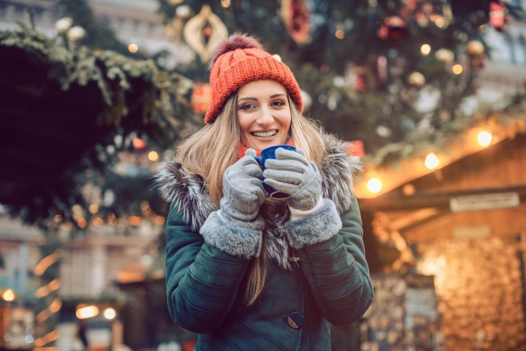 Woman at Christmas Markets in Germany in Winter