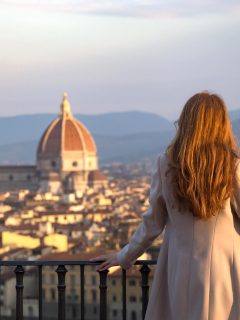 Woman overlooking the Florence skyline in. NOvember