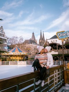 Couple at ice rink at Chrsitmas MArket in Germany in December