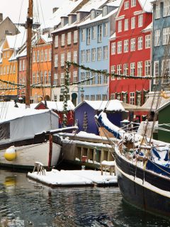 Nyhavn boats covered in boats in Copenhagen in December