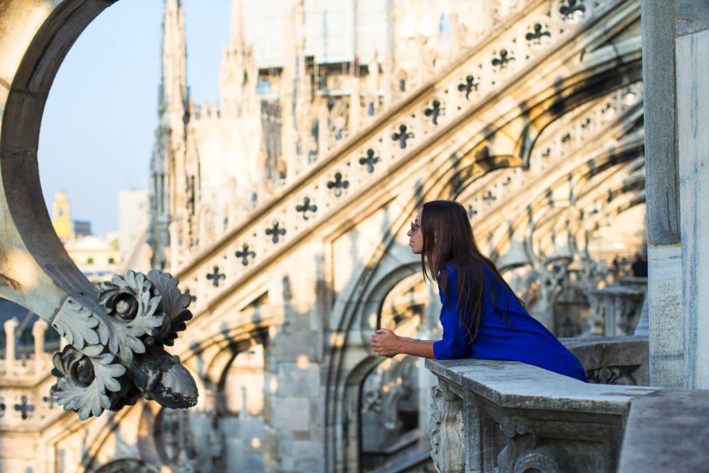 Woman on Rooftop of Milan Cathedral in Modest outfit
