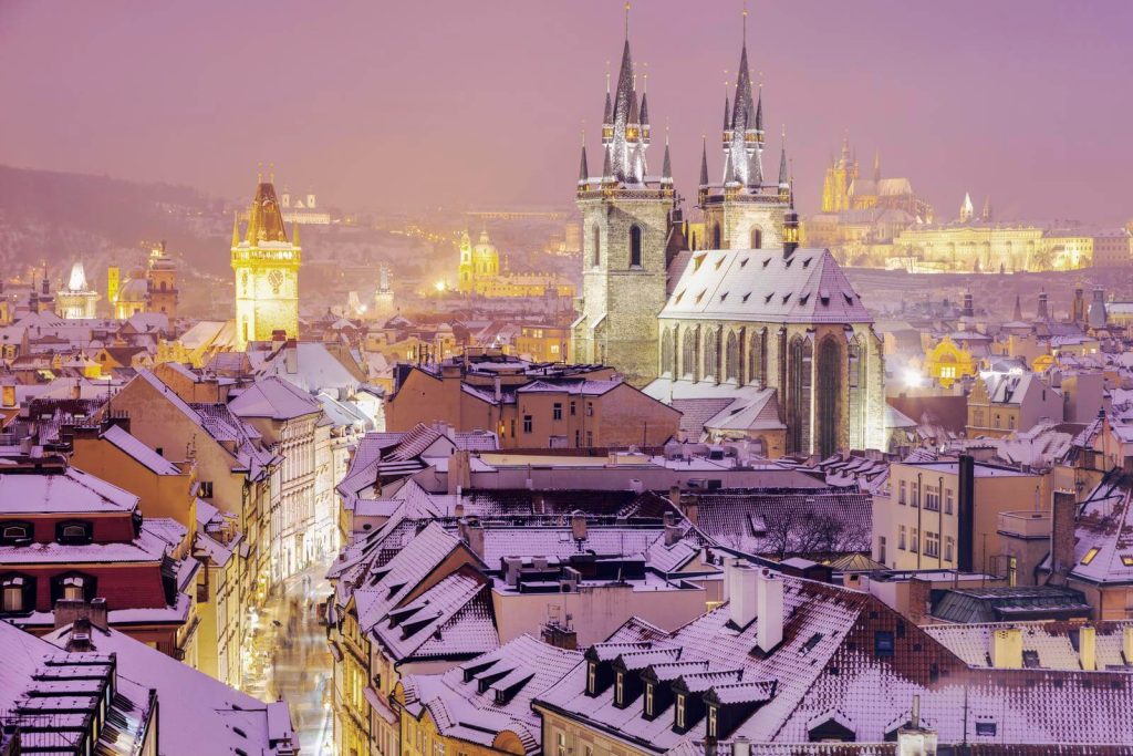View across skyline of Prague in snow