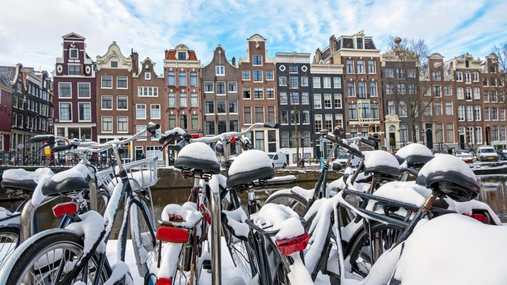 Bikes covered in snow in Amsterdam in February