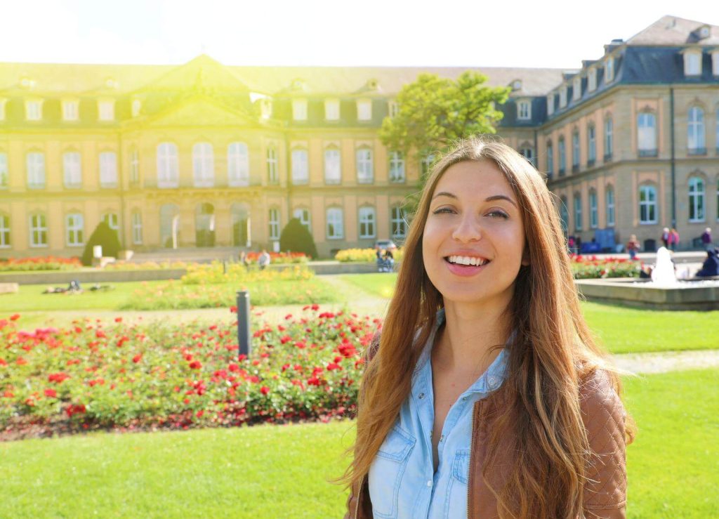 Woman in front of Neues Schloss Palace Stuttgart in Spring