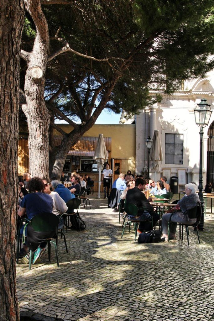 People eating dinner al fresco in Portugal in March