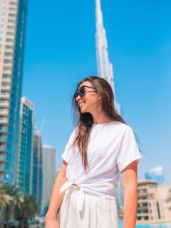 Woman smiling in front of Burj Khalifa in January